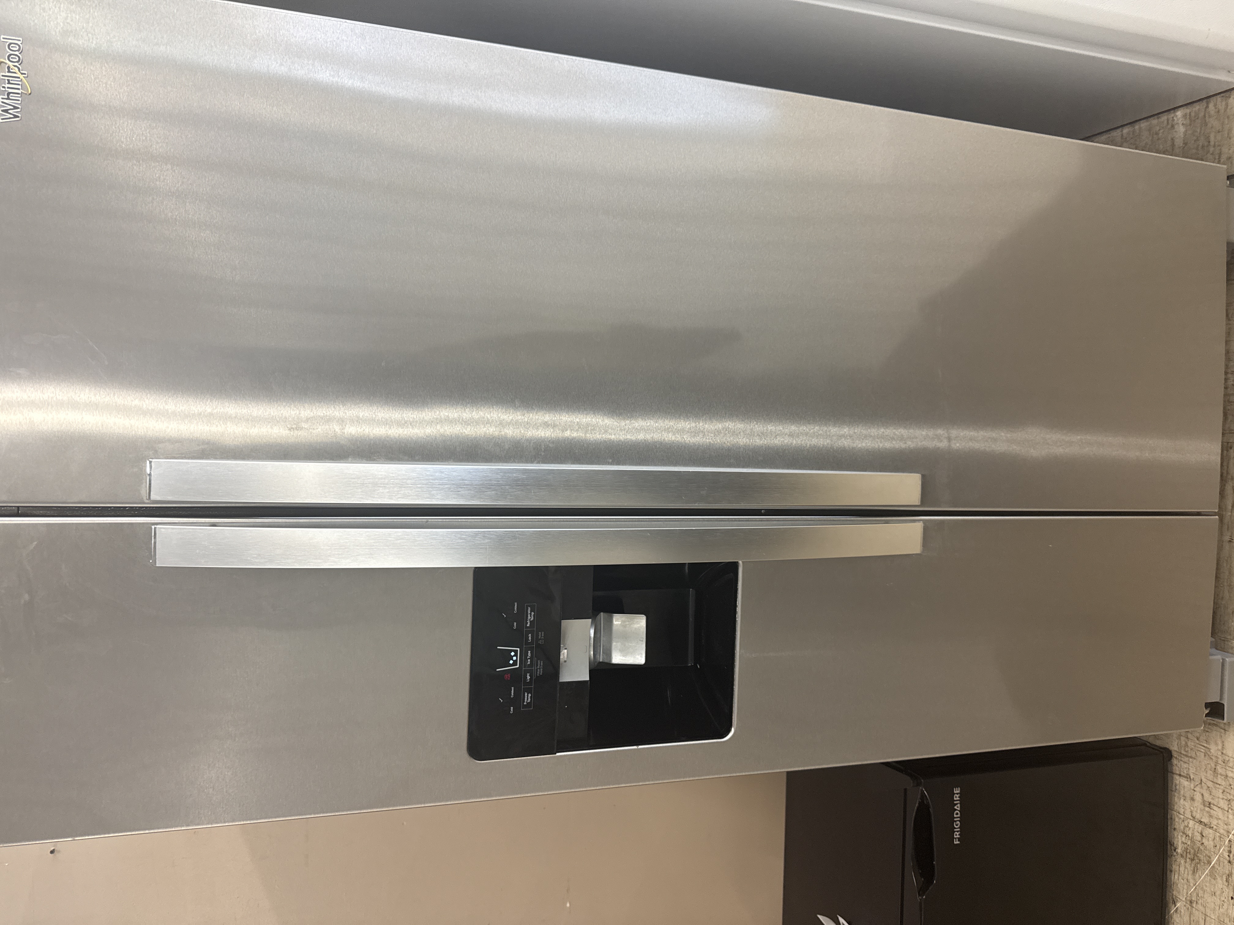 Stainless Steel Whirlpool Refrigerator - Pre-loved furniture Central Florida