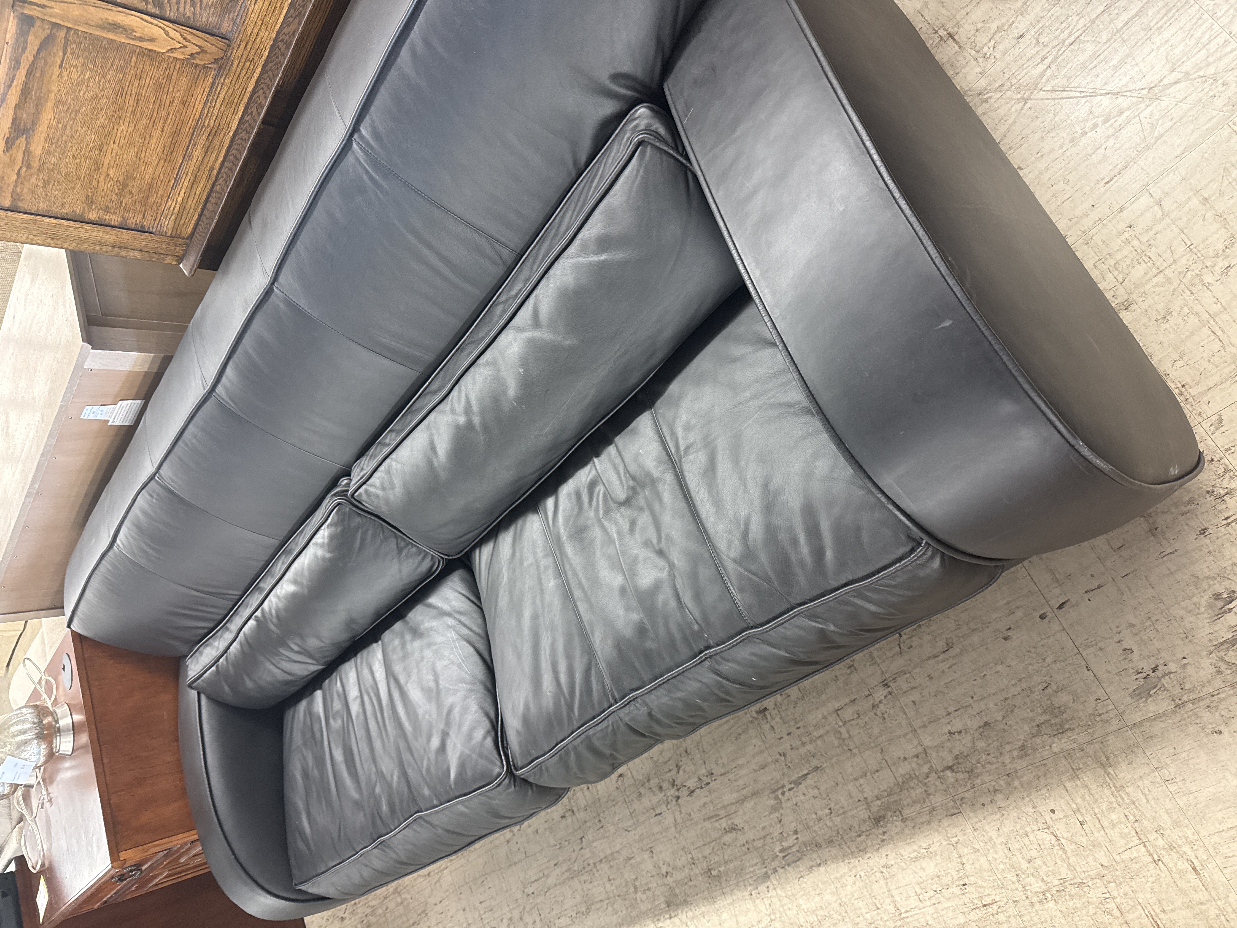 Black Leather Sofa - Pre-loved furniture Central Florida